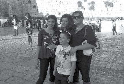 Kadosh and her family at the Western Wall in Jerusalem during a trip home during summer 2012. The Western Wall is an iconic and holy site in Israel.