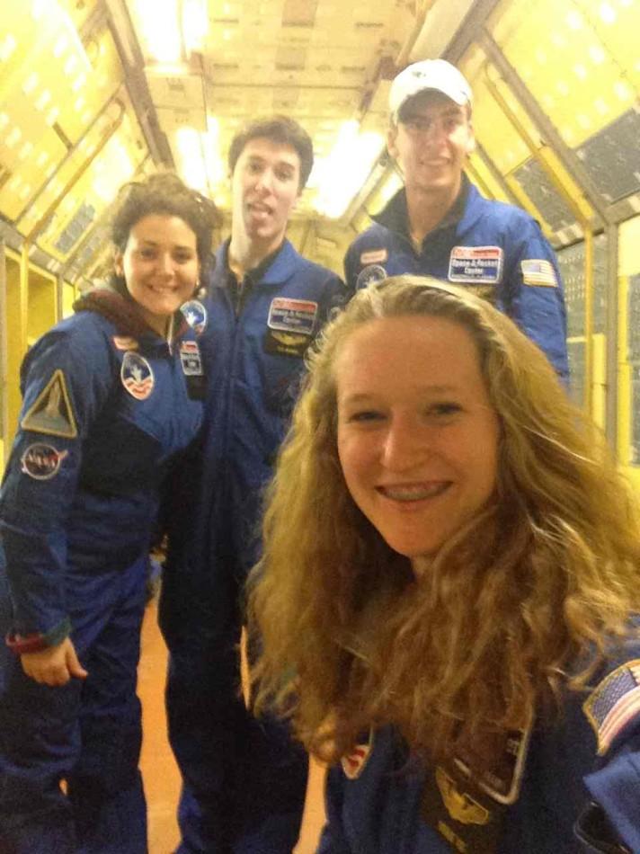 My group in one of the space simulations as if we were on the International Space Station.