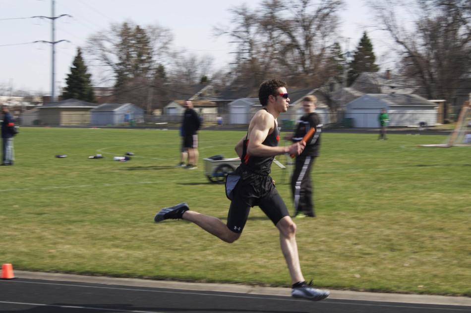 Sophomore Christopher Trotter broadens the gap between his competitors in the third leg of the 4 x 800 relay.