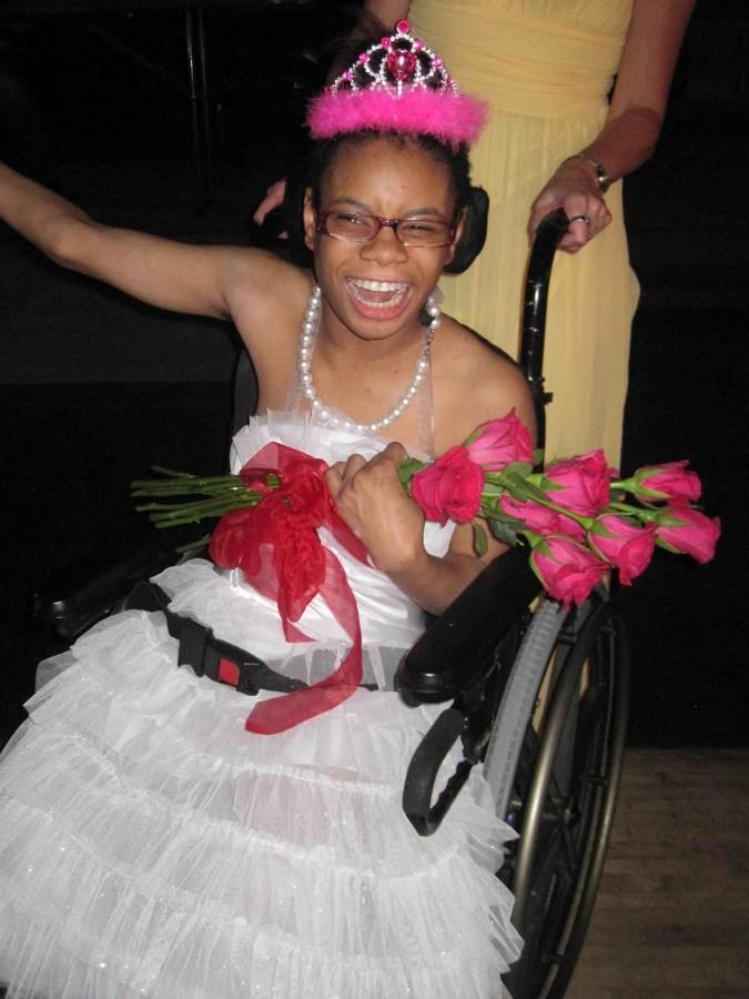Park senior Angel Catlett celebrates becoming Prom queen. A random selection from the group of students attending the dance led to her receiving the title.