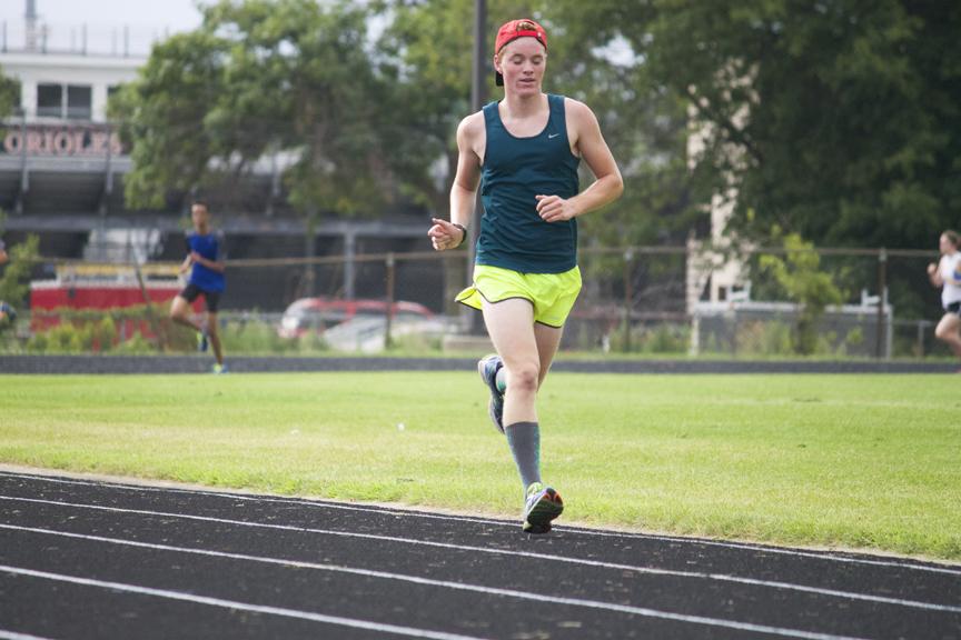 Senior Liam Schmelzle keeps a steady pace during cross country practice on Aug 20.