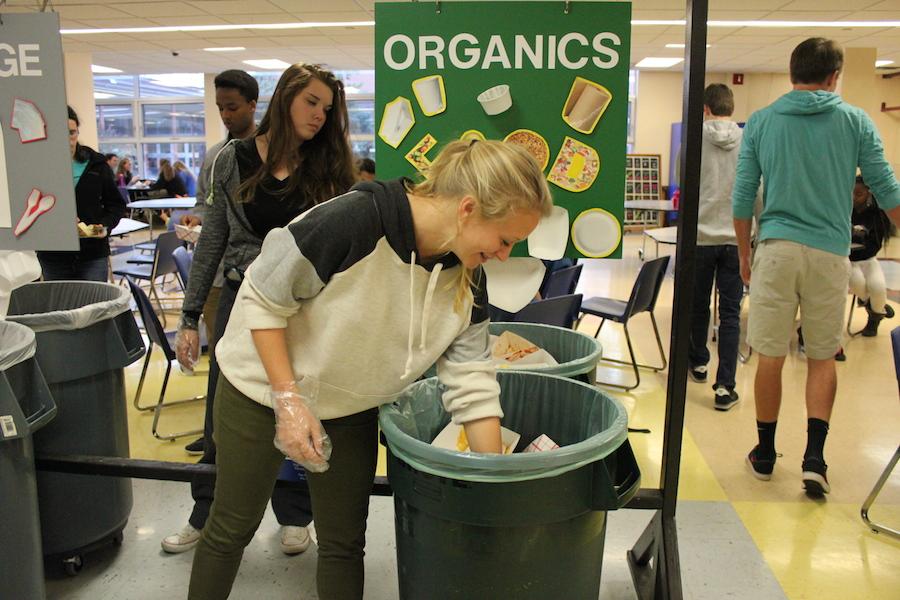 Sophomore Sofia Roloff sorts through the trash during her lunch, a job all roots and shoots members do.