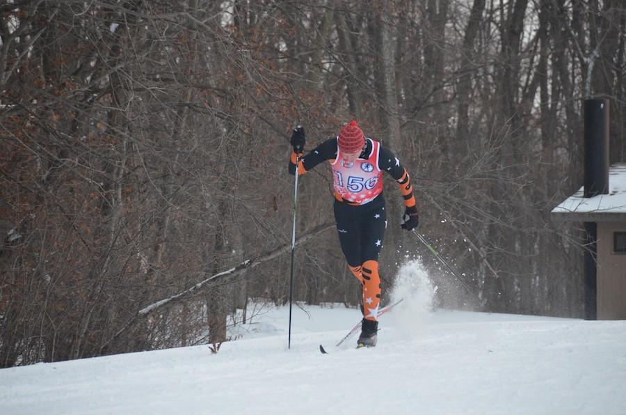 Skiing forward: Junior Jens Albright participates in a classic conference meet at Hyland Park Reserve Jan. 8. The boys team placed first in this conference meet against Bloomington, Chaska-Chanhassen, Benilde, and Richfield. Bloomington placed second and Chaska-Chanhassen placed third.