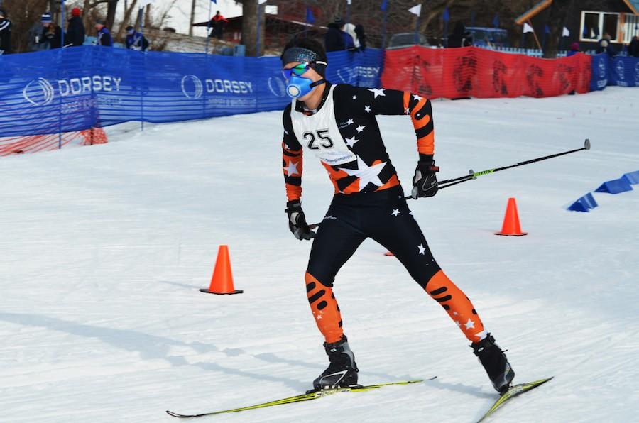 Junior Ben Chong skis around a turn to start his race during the Section 6 meet on Feb. 2.