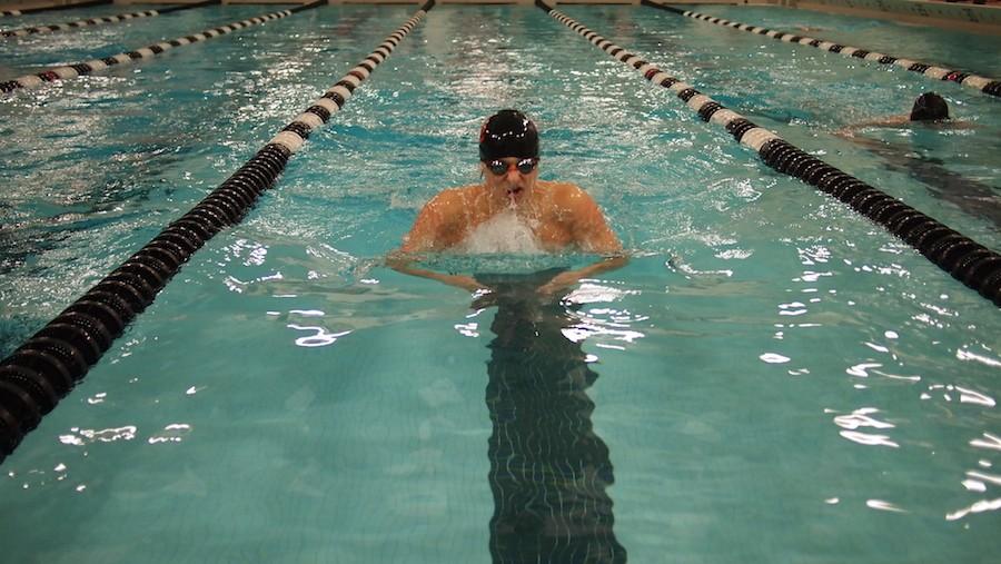 Sophomore Nate Stone participates in 200 meter Individual Medley placing first in the event against Chaska.