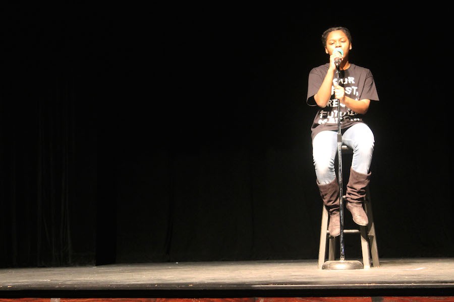 Junior Samara Ray sings during the Black History Month performance.