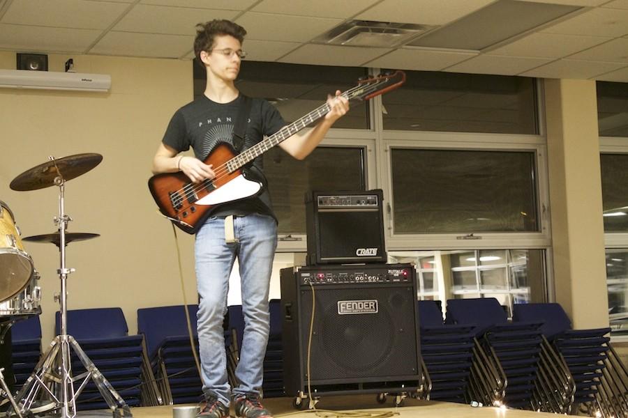 Sophomore Troy Richardson plays bass in his band Crosswalk during his battle of the bands performance Feb. 19.
