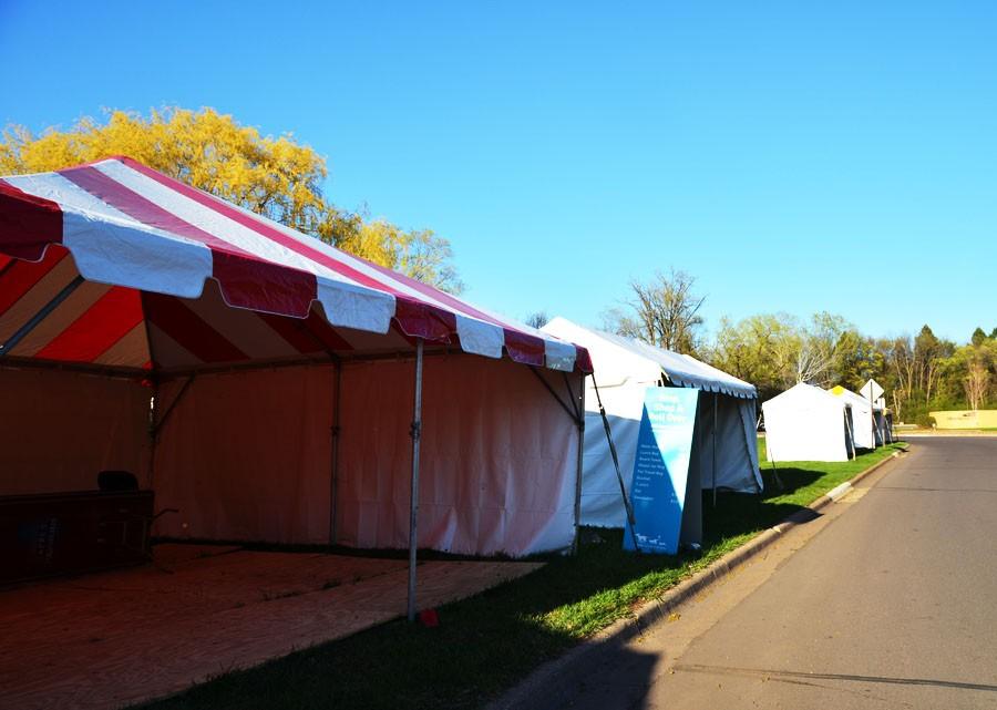 Tents line the street up to the Animal Humane Society in preparation for the event. Different activities will be held in each tent for participants.
