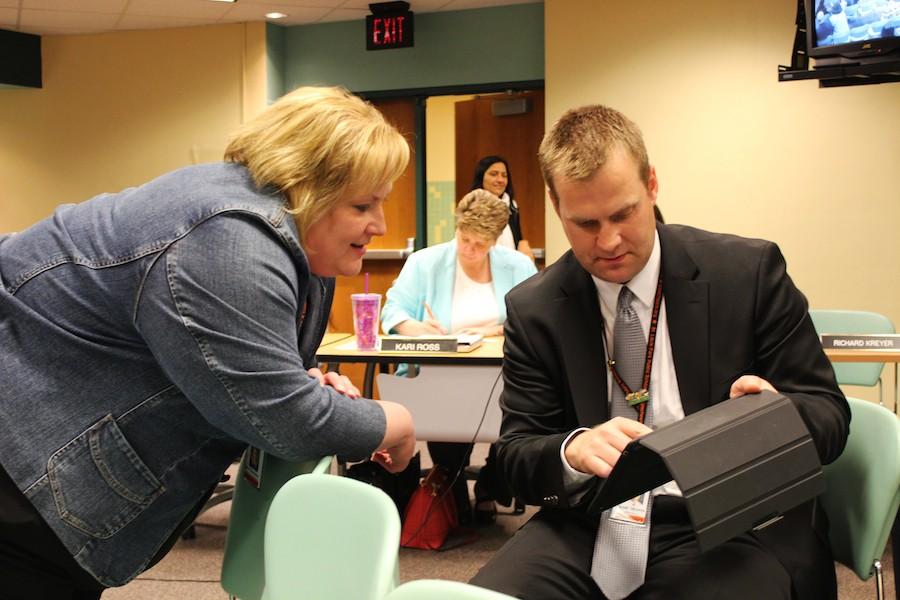 Interim principal Scott Meyers talks with Sara Thompson, Director of Communications and Community Relations for Park schools.
