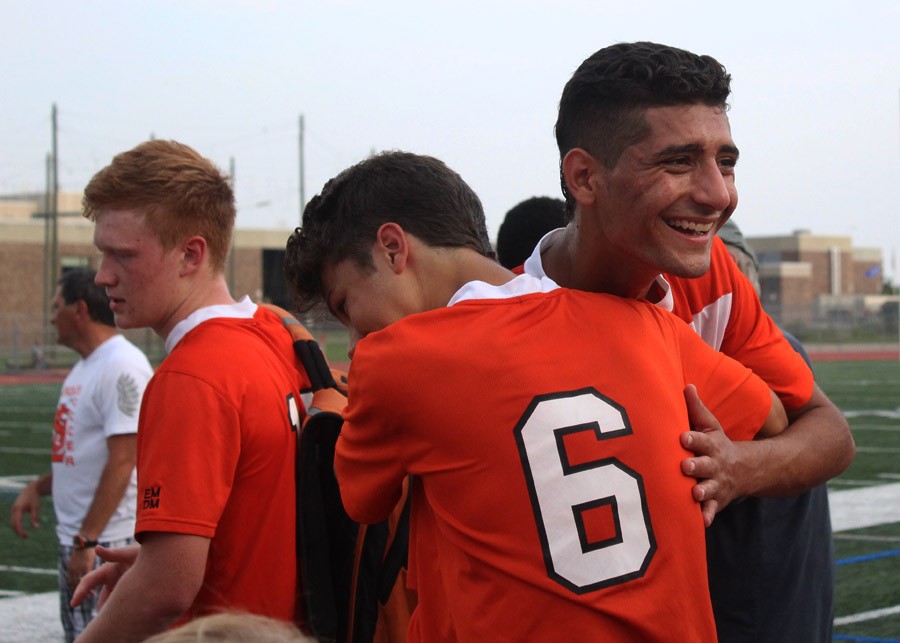 Junior Miguel Ocampo and Senior Hussein Al-tmeemi celebrate after the 3-1 win against Hopkins Sept. 1.