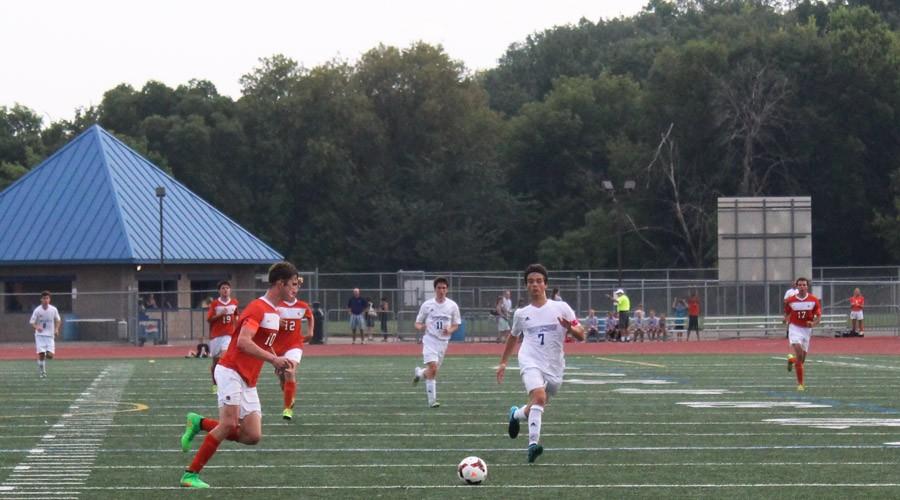 Senior Max Kent sprints to the ball at their game against Hopkins Sept. 1.