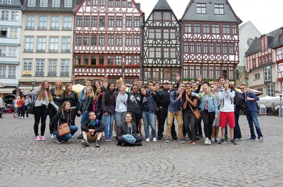 The whole group of Americans and German hosts pose in Frankfurt am Main on the marketplace. 