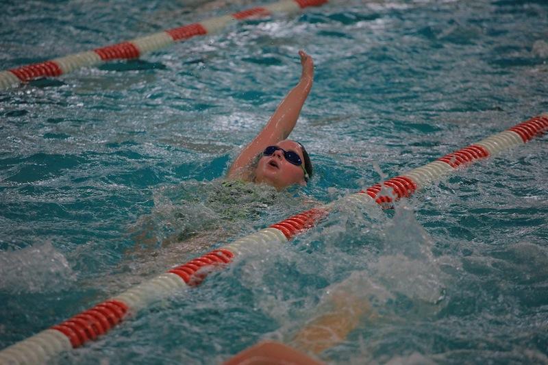 Freshman Grace Steffy swims backstroke during practice Sept. 22.