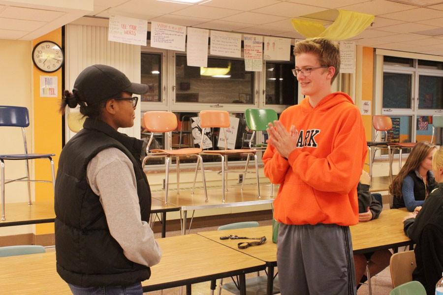 Sophomore Collin Perkins and junior Genesis Buckhalton chat during an ice breaker game at the first FCA meeting Oct. 12.