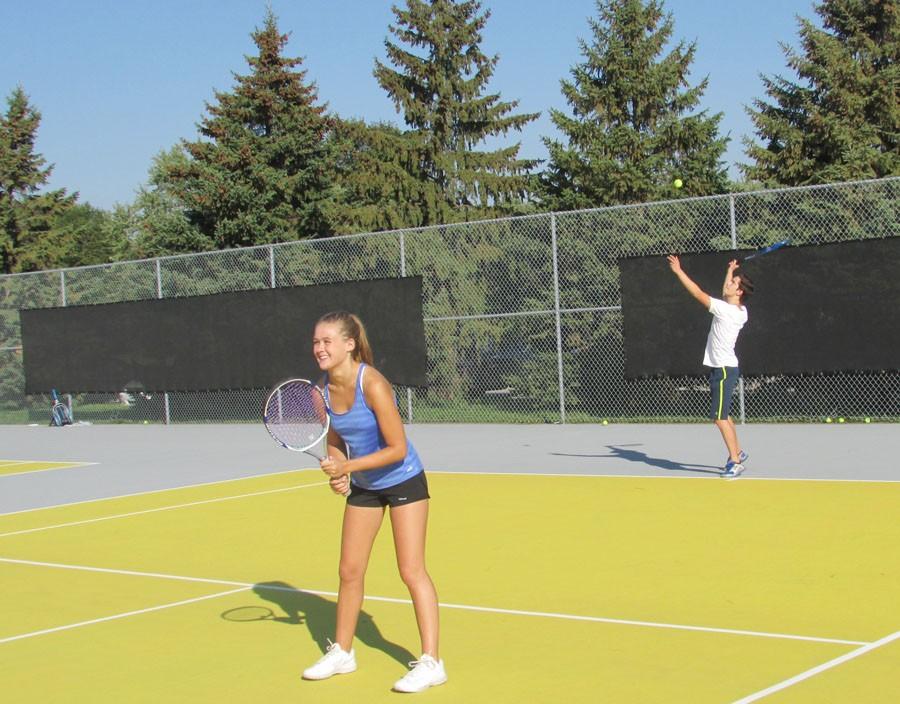 Sophomores David Salamzadeh and Lillie Albright partnered up to participate in the girls tennis fundraiser.