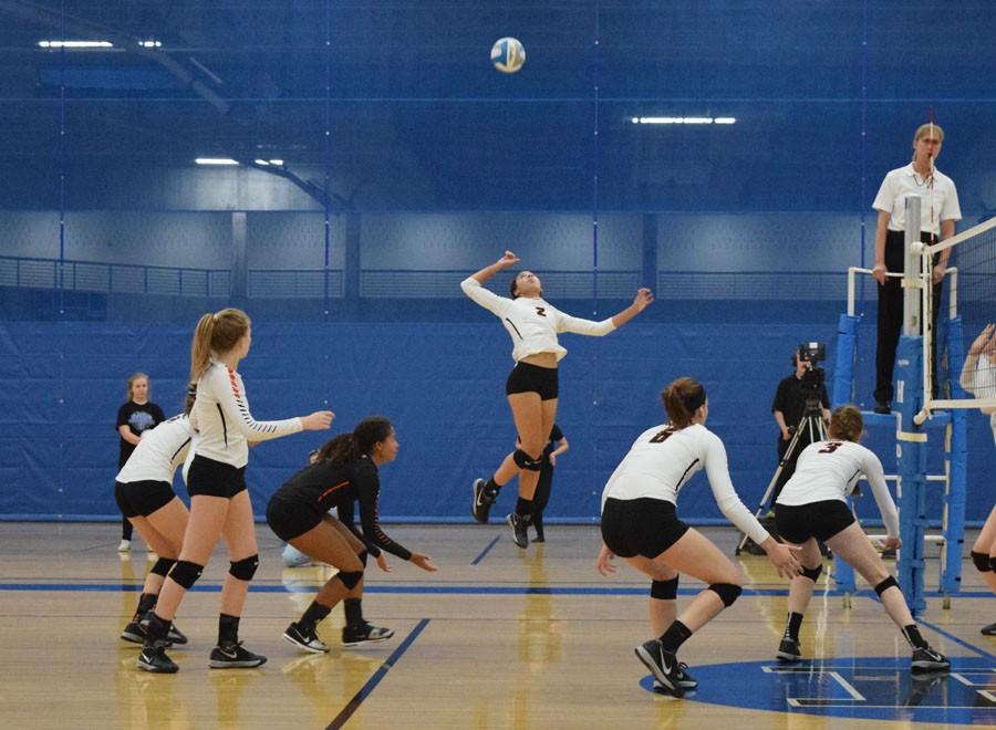 Sophomore Ella Trotter spikes the ball against Bloomington Jefferson. The team lost 0-3 on Oct. 29.