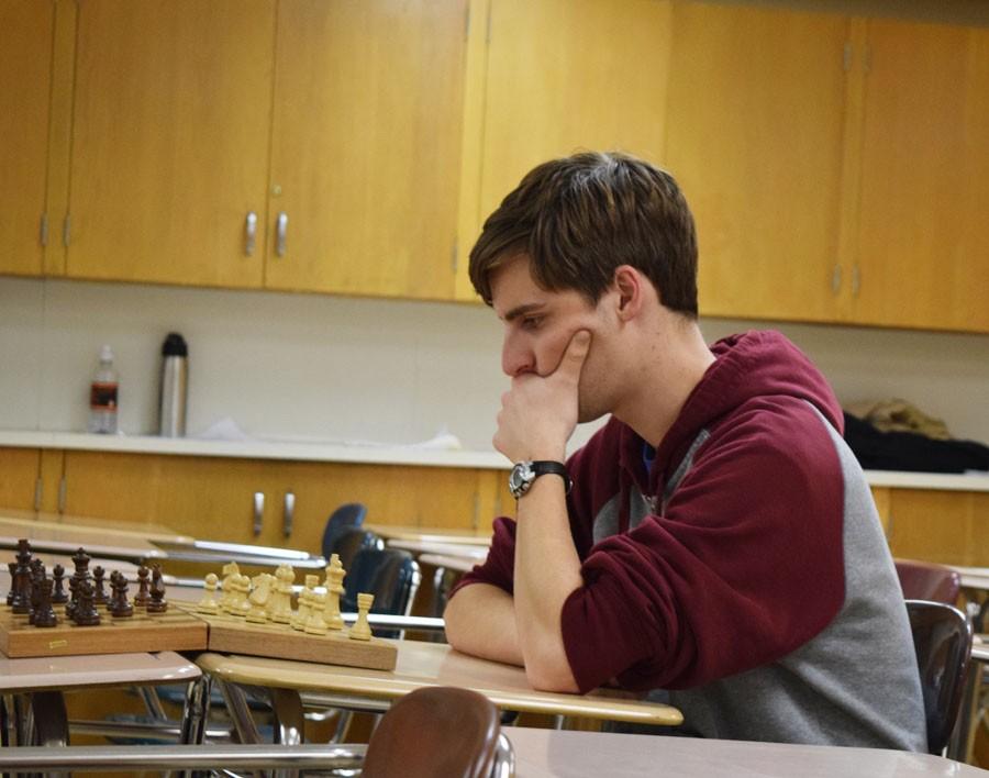 Junior Eric Manuel concentrates as he thinks about where to move next turn. 
