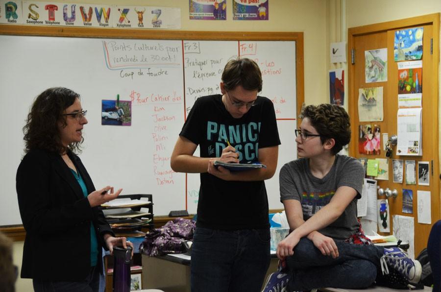 Madam Sweeney, Thomas Bryant and Elise Bargman work together during a meeting Nov. 3.