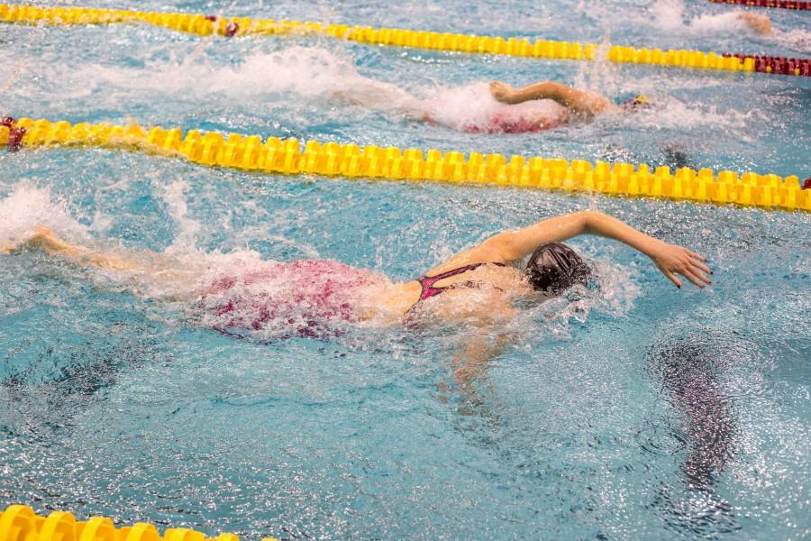 Junior Kailey DeLozier races to the finish of her event at the girls swimming state championship Nov. 20 at the University of Minnesota Aquatic Center.