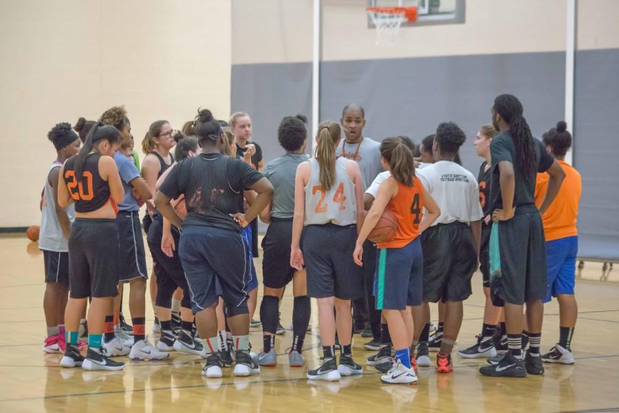 The SLP girls basketball team huddles before practice Nov. 24.
