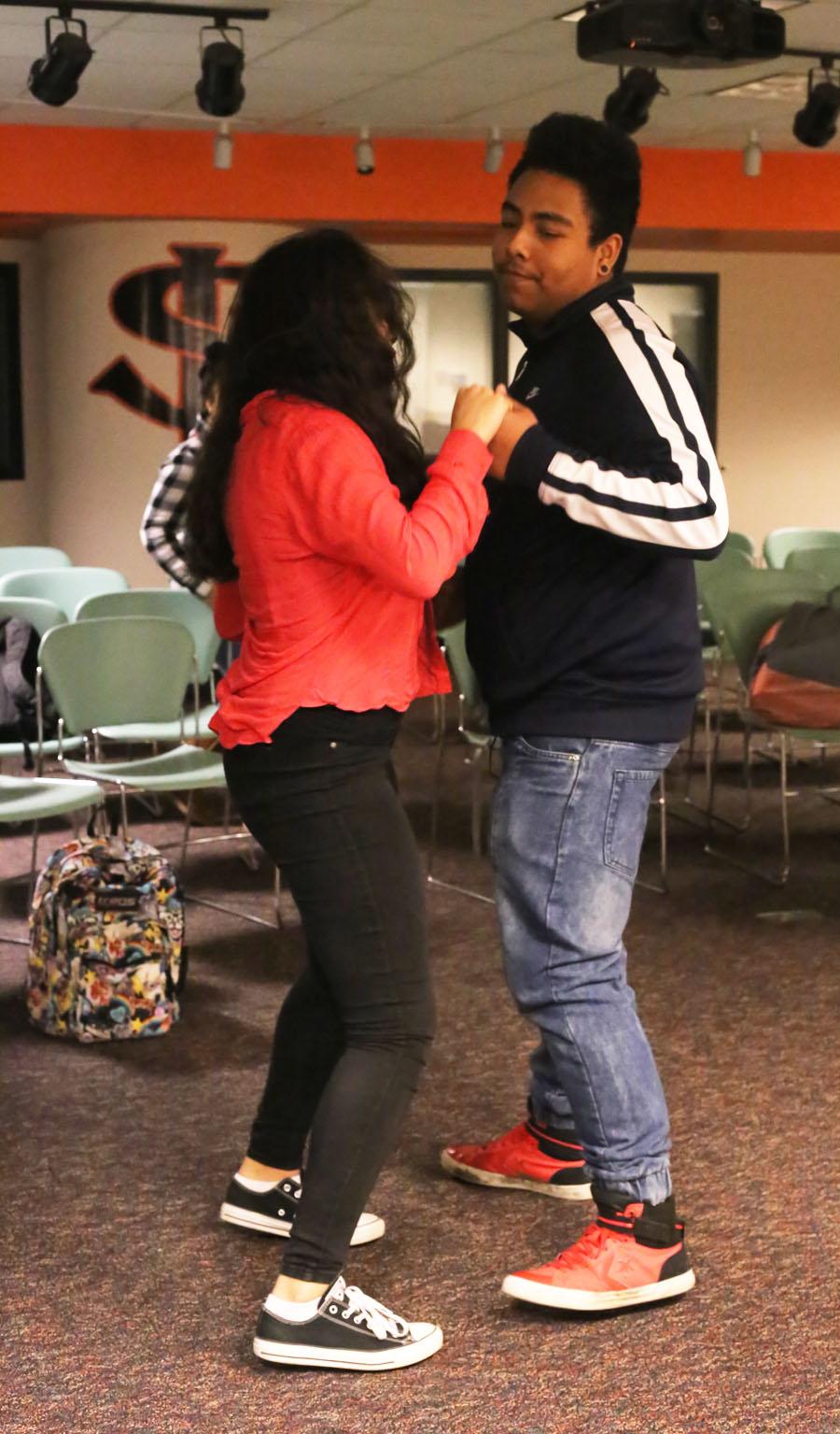 Students of the Latino Student Association dance to fun music to explore cultural differences.