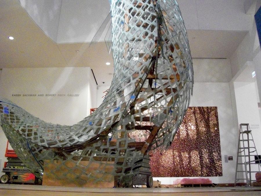The Standing Glass Fish sculpture is now located at the Weisman Art Museum. It was originally located at the Sculpture Gardens in Minneapolis. Progress is still being made on its re-construction.