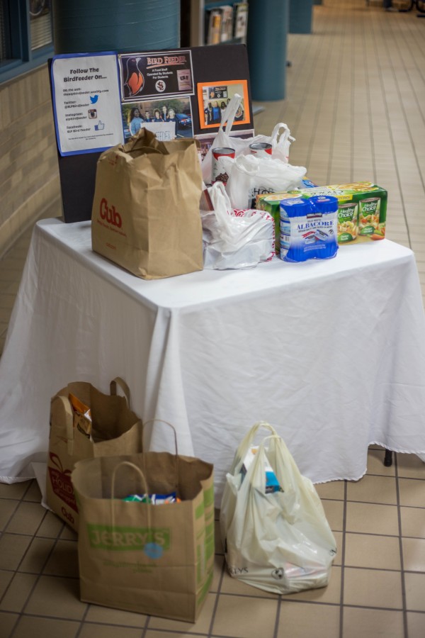 Table showing food items being donated to the St. Louis Park High School Bird feeder on Dec. 21.