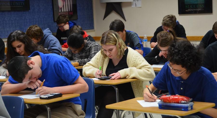 Junior Chloe OGara works on the individual math test for the tournament at Minnetonka high school, September 14th