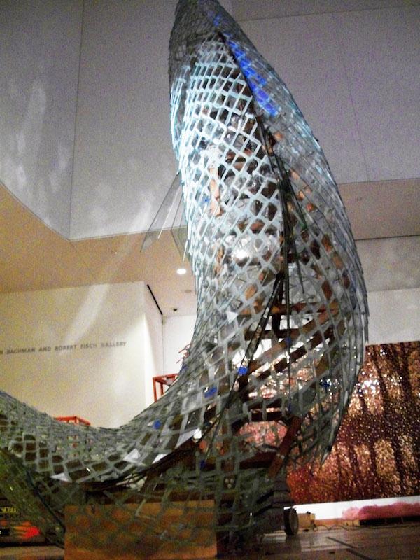 The Standing Glass Fish sculpture has been moved from the Sculpture Gardens of Minneapolis.  It is being rebuilt in its new location the Weisman Art Museum.