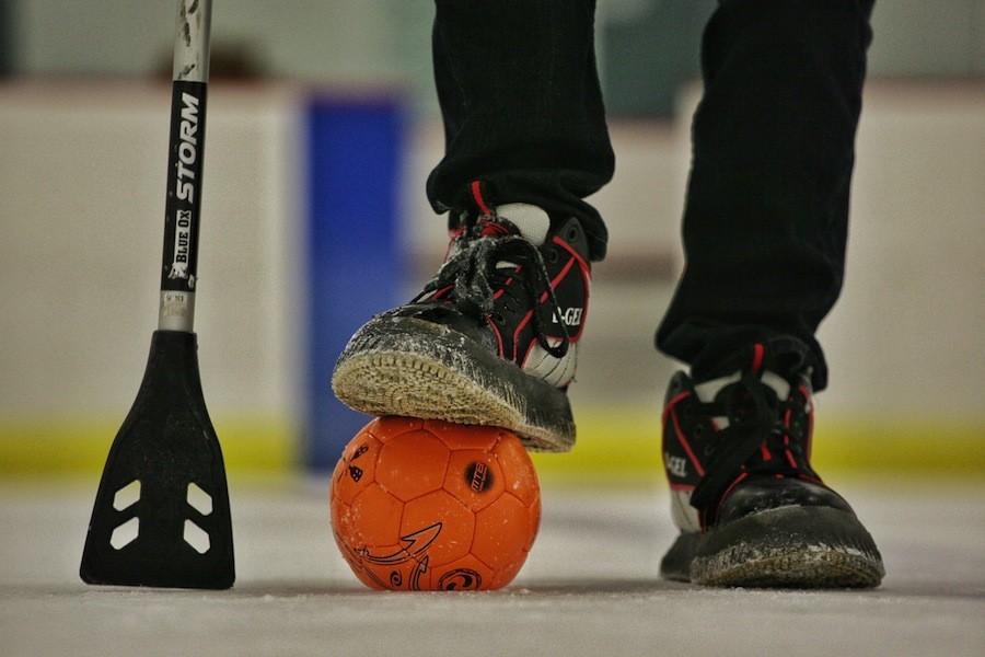 Team Schwang uses a broomball, a broomball stick, and special shoes for the ice to play the game.
