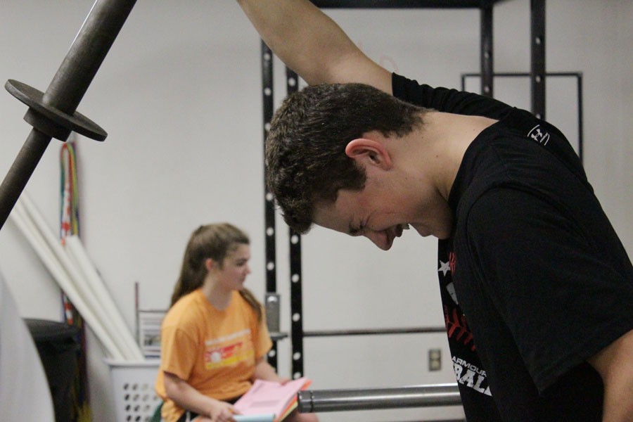 Junior Noah Fracassi lifts a weight during strength and conditioning Friday Jan. 8.