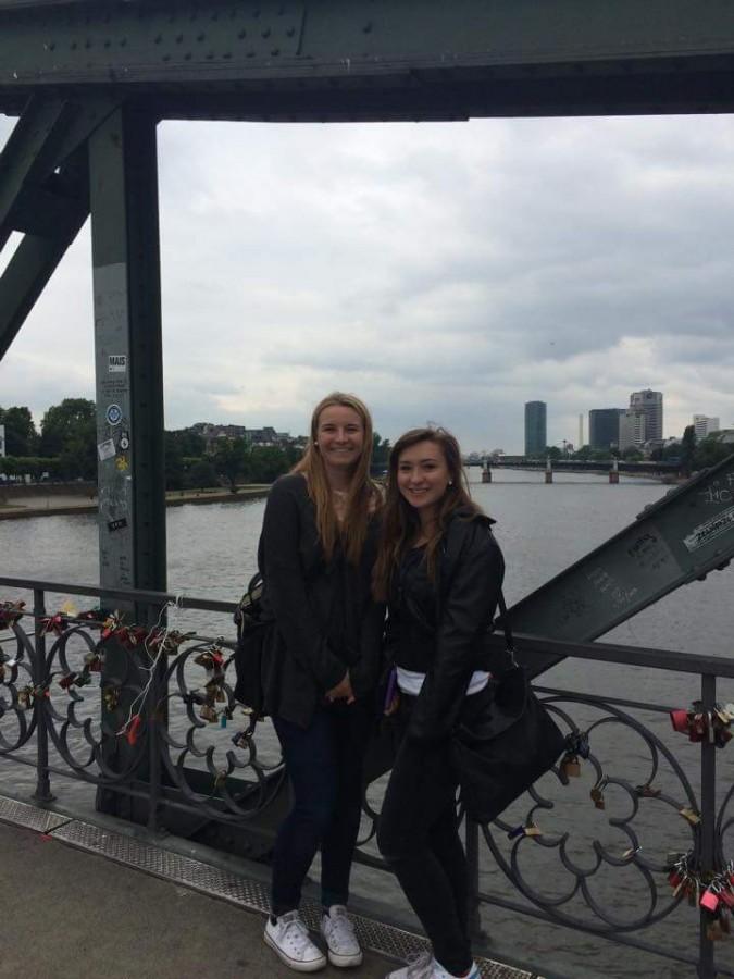 Junior Kim Brandt, right, and her host sister pose for a picture on a bridge in Frankfurt during Brandts trip to Germany in the summer of 2015. Brandt plans to study in Germany after high school.
