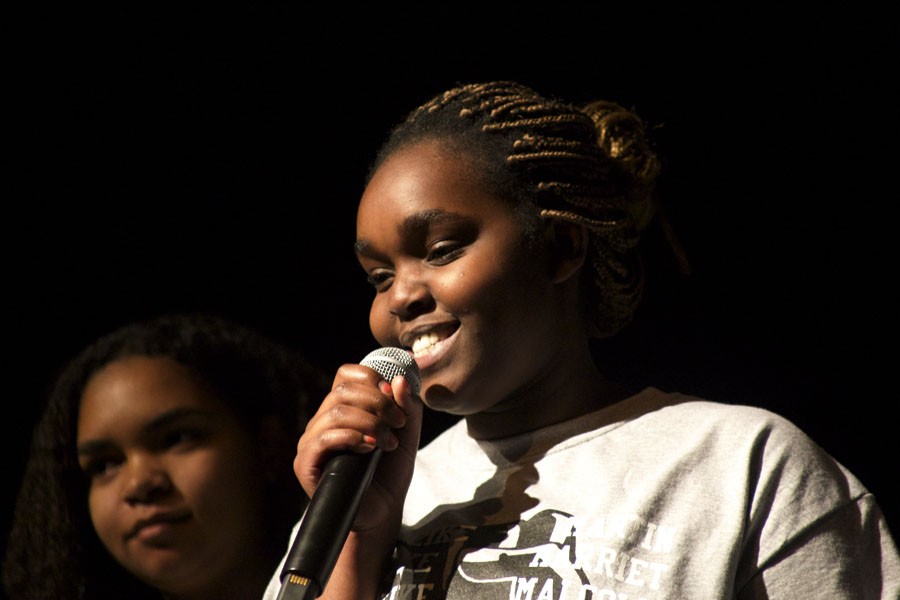 Sophomore Doreen Moranga recites the words to the song Where Is The Love by The Black Eyed Peas during the Black History Month Performance Feb. 29.