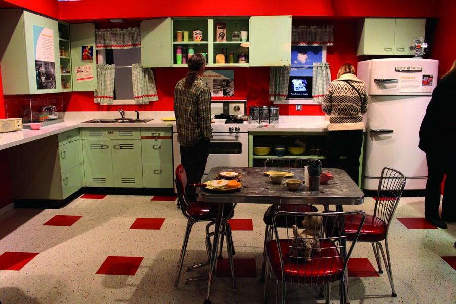 City highlights: Visitors explore the kitchen 
featured at the “Suburbia” exhibit in St. Paul. The kitchen is interactive and includes a sink, oven, refrigerator, appliances and plastic food, allowing the public to experience home life after World War II.