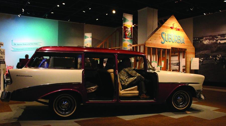 Exhibit on wheels: A 1956 Chevrolet lets visitors discover new opportunities available to citizens in this era. The auto industry popularized parking lots, shopping malls, drive-in restaurants and movie theaters.