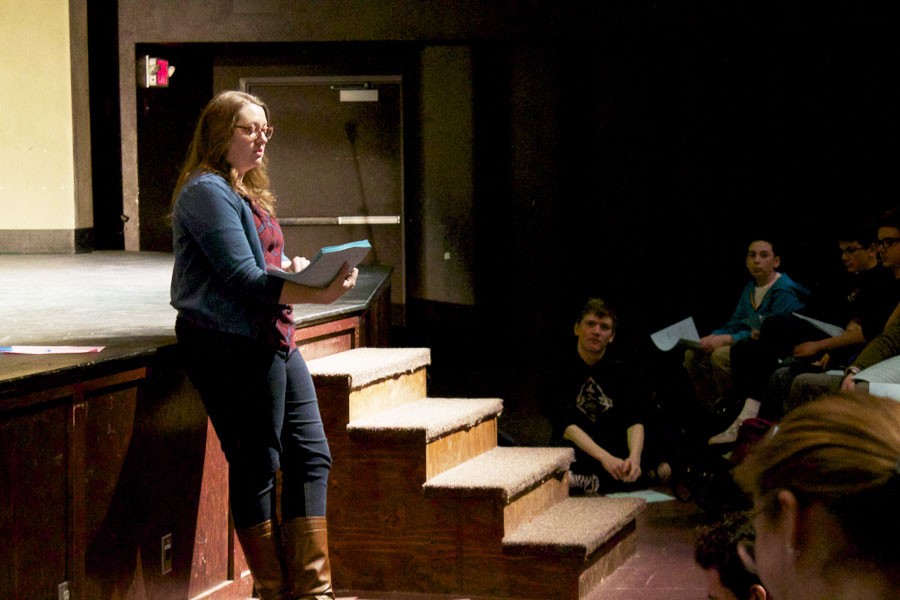 Director Jodi Hatzenbeller reads rules and requirements to audition for the upcoming spring play at the meeting Feb. 29.