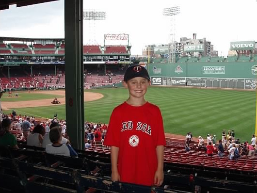 Freshman Cyrus Abrahamson stands in Fenway Park, the Red Soxs stadium, in Boston. 