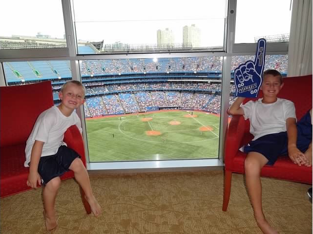 Freshman Cyrus Abrahamson and his brother sit above the Bluejays stadium in Toronto. 
