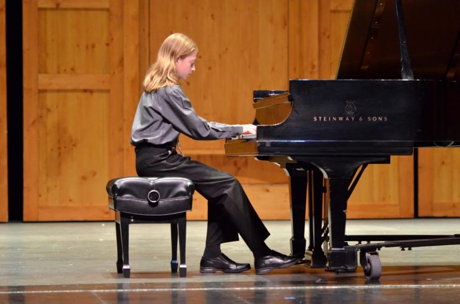 Freshman Marco Giovannelli plays at the Colorado Suzuki Institute during the summer as part of the recital program. 