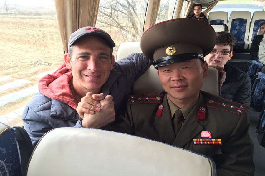 History teacher Jeff Cohen poses with a North Korean official during his April trip to North Korea. Photo used with written permission from Jeff Cohen.
