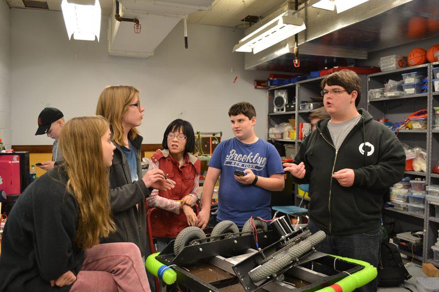 The robotics team goes over last minute strategy at a meeting prior to their competition on April 8. The team placed 49th out of 63 teams. 