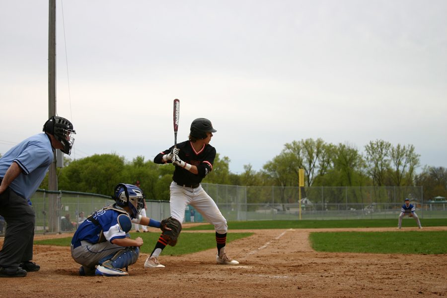 Senior Patrick Bordewick loads to swing in his first at bat April 30. The team beat Hopkins 11-10. The baseball players hit the field at 7 p.m. today at Dakota Park against Benilde-St. Margarets.