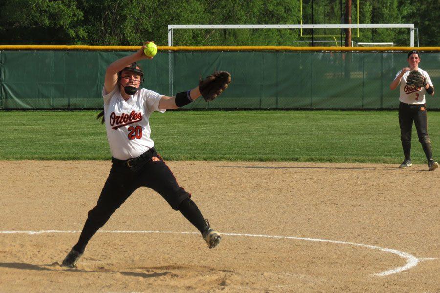 Starting pitcher, sophomore Annabelle Schutte, goes through her wind up as she prepares to deliver the pitch against Wayzata. May 24.