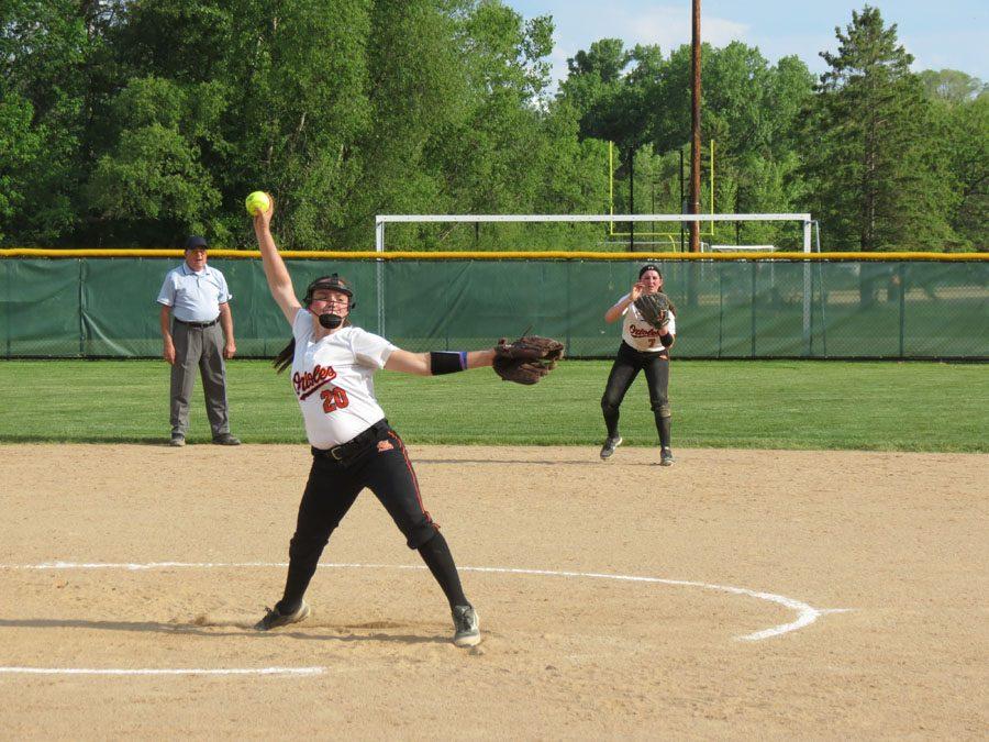 Starting pitcher, sophomore Annabelle Schutte, goes through her windup as she prepares to deliver the pitch against Wayzata. May 24.