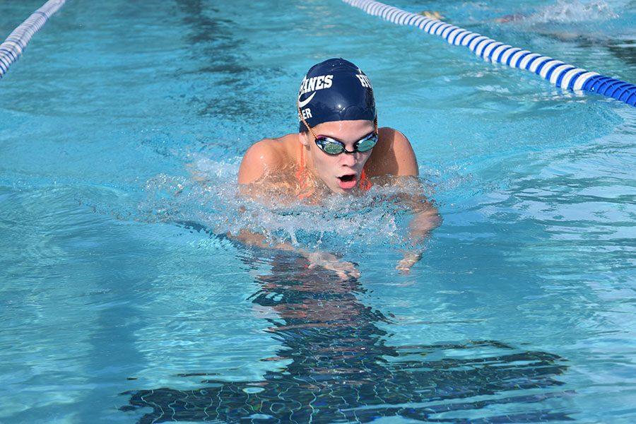 Freshman Hattie Kugler practices breast stroke Aug.15. The girls swim team has its first dual meet Aug. 30 at North Junior High against Hopkins. 