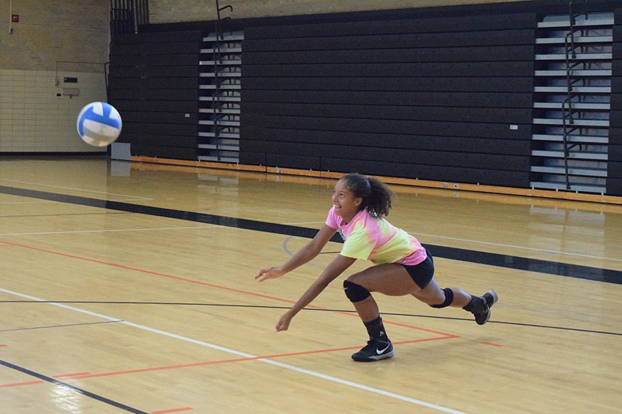 Sophomore Maddy McIntosh returns a serve during volleyball practice Aug. 19. The teams first game takes place at 7 p.m. Aug. 25 at Minneapolis Washburn High School against the Washburn Millers.
