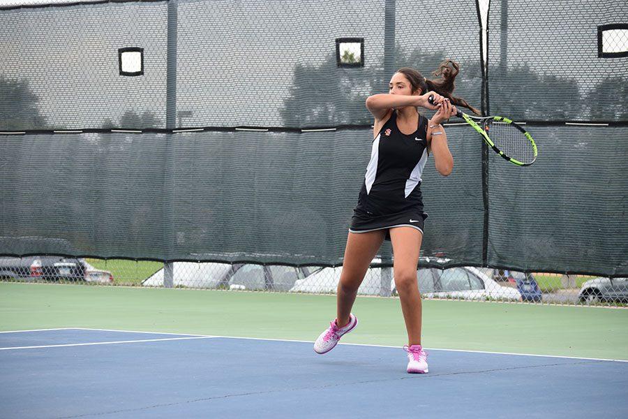 Freshman Racquel Fhima contributed to her teams final score of 7-0 after winning her match on Tuesday against Bloomington Kennedy. 