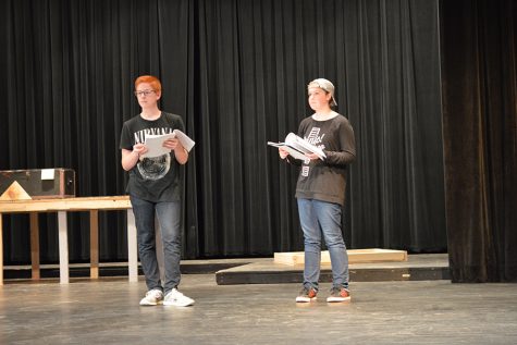 Junior Ben Romain and sophomore Preston Pepperell write down notes during choreography rehearsal Sept. 16. "The Drowsy Chaperone" performances are on Nov. 11-13 and 18-20.