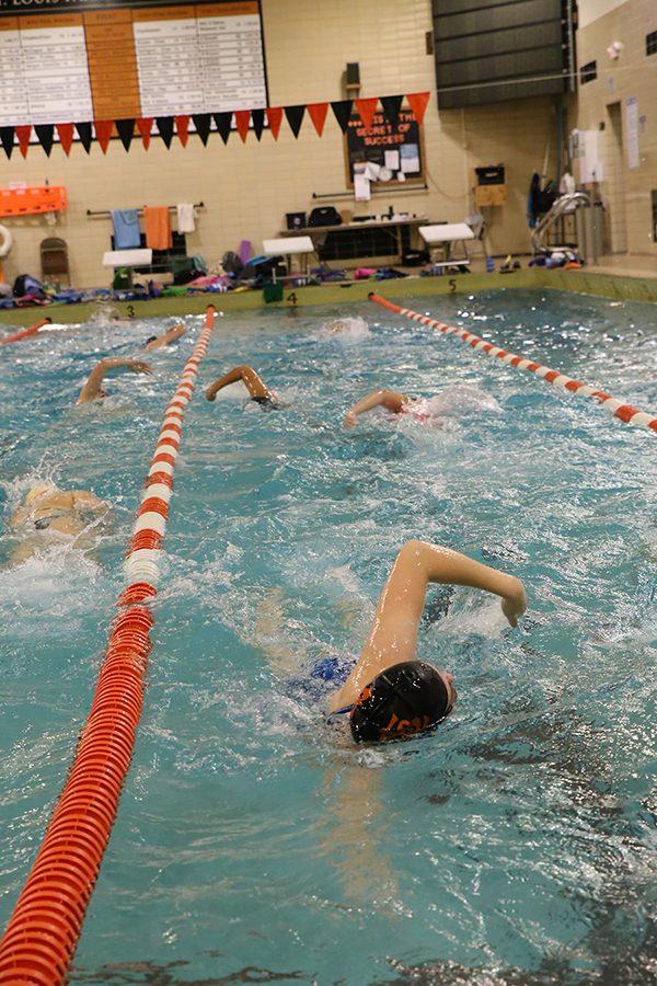 Junior Nicole Sanford practices intervals with the rest of the girls swim team on Sept. 19.