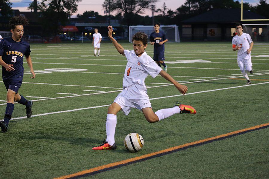 Sophomore Nicolas Beaton plays midfield during the Sep. 13 game vs Bloomington Kennedy on home turf. The next boys soccer game is a home game on Sept. 22 at the St. Louis Park High School stadium.